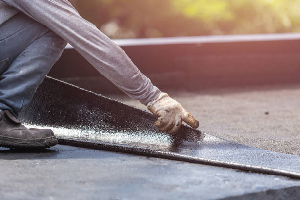 Professional Waterproofing technician working in Oakville, IN